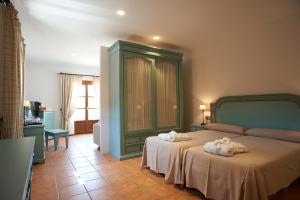 Ein Bett oder Betten in einem Zimmer der Unterkunft Agroturismo Son Marge
