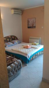 a bedroom with two beds in a room at Apartment Angelina in Risan