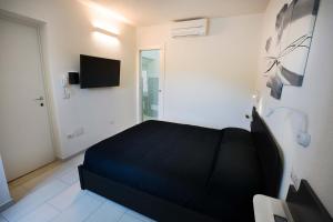 A television and/or entertainment centre at The House On The River