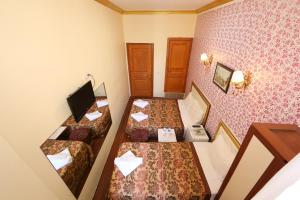 TV a/nebo společenská místnost v ubytování Meddusa Hotel