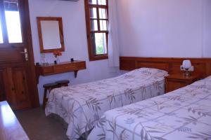 Postel nebo postele na pokoji v ubytování Elze Hotel