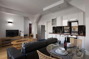 Kuchyň nebo kuchyňský kout v ubytování Luxoise Apartments