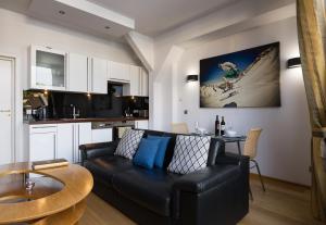 Kuchyň nebo kuchyňský kout v ubytování Luxoise Apartments