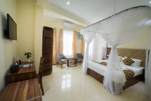 Postel nebo postele na pokoji v ubytování Spice Palace Hotel