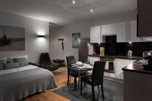Kuchyň nebo kuchyňský kout v ubytování Luxoise Apartments