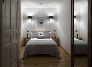 Postel nebo postele na pokoji v ubytování Luxoise Apartments