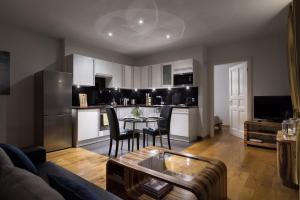 Kuchyň nebo kuchyňský kout v ubytování Luxoise Apartments