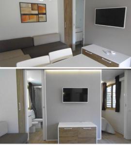 A television and/or entertainment centre at Camping Eden