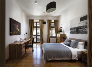 Postel nebo postele na pokoji v ubytování Luxoise Apartments