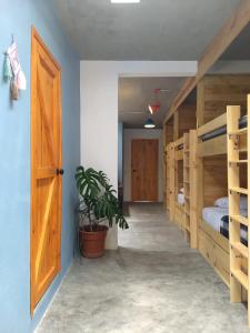 Un ou plusieurs lits dans un hébergement de l'établissement La Abuelita Hostal