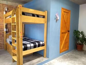 Un ou plusieurs lits dans un hébergement de l'établissement La Abuelita Hostal