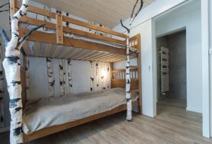 Postel nebo postele na pokoji v ubytování La Ferme des Arêtes