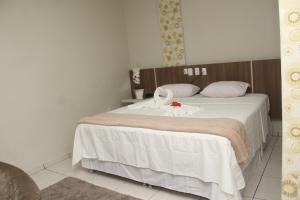 Posteľ alebo postele v izbe v ubytovaní Hotel Acai