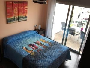 Postel nebo postele na pokoji v ubytování Apartamento Puerto Real