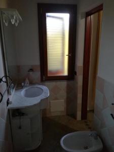 Kúpeľňa v ubytovaní B&B funtanadetalia