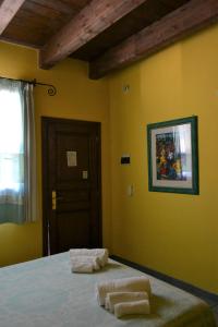Postel nebo postele na pokoji v ubytování Hotel dell'Ancora
