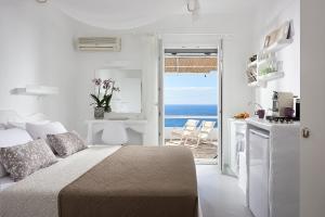 Postel nebo postele na pokoji v ubytování Vista Mare Milos