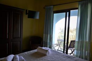 Postel nebo postele na pokoji v ubytování Hotel dell'Ancora