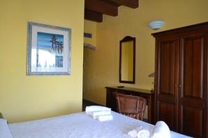 Postel nebo postele na pokoji v ubytování Hotel dell'Ancora