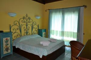 Postel nebo postele na pokoji v ubytování Hotel dell'Ancora