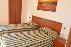 Postel nebo postele na pokoji v ubytování Hotel Nicolaj