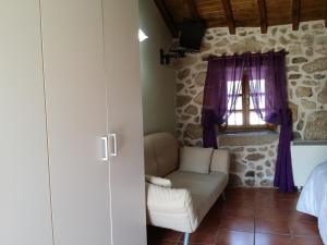 Część wypoczynkowa w obiekcie Casa Rural Vella da Rivera