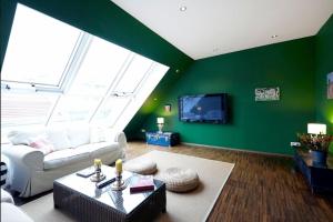 Telewizja i/lub zestaw kina domowego w obiekcie Vienna Penthouse 1
