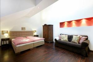 Łóżko lub łóżka w pokoju w obiekcie Vienna Penthouse 1