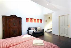 Łóżko lub łóżka w pokoju w obiekcie Vienna Penthouse 1