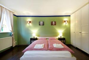 Łóżko lub łóżka w pokoju w obiekcie Vienna Penthouse 1