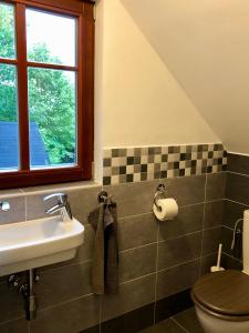 Ένα μπάνιο στο Guest House K74