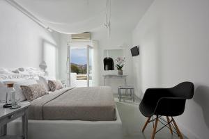 Postel nebo postele na pokoji v ubytování Milos Hotel + 28 fotografií