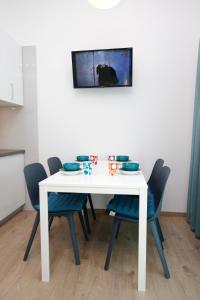 TV a/nebo společenská místnost v ubytování Apartments Besker