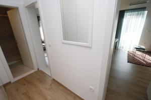 Postel nebo postele na pokoji v ubytování Apartments Besker
