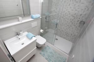 Koupelna v ubytování Apartments Besker