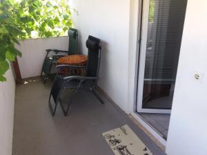 Televízia a/alebo spoločenská miestnosť v ubytovaní Guesthouse Eljuga Family