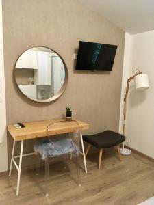 TV a/nebo společenská místnost v ubytování Apartments Besker