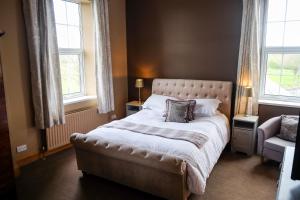 Tempat tidur dalam kamar di York House Durham