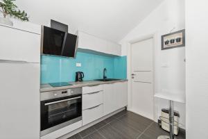 Kuchyň nebo kuchyňský kout v ubytování Apartment Nikola