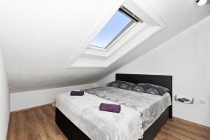 Postel nebo postele na pokoji v ubytování Apartment Nikola