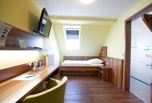 Postel nebo postele na pokoji v ubytování Hotel Meyer