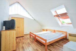Postel nebo postele na pokoji v ubytování Oliver Inn