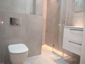 Kúpeľňa v ubytovaní Klopot 4 Apartment + 14 fotografií
