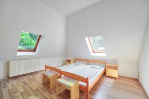 Postel nebo postele na pokoji v ubytování Oliver Inn