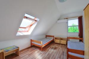 Postel nebo postele na pokoji v ubytování Oliver Inn