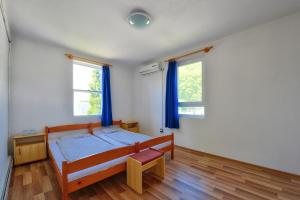 Postel nebo postele na pokoji v ubytování Oliver Inn