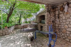 Patio nebo venkovní prostory v ubytování Apartments and Room Drazen