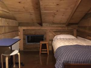 Postel nebo postele na pokoji v ubytování Hostal Climb House