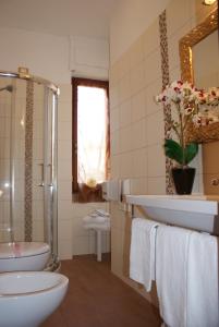 Koupelna v ubytování Hotel Michela