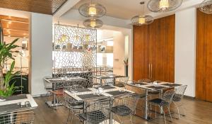 Restoran või mõni muu söögikoht majutusasutuses Modena by Fraser Putuo Shanghai